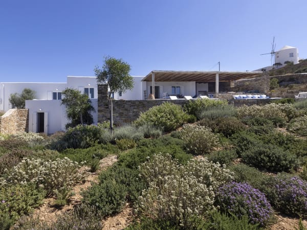 Beautifully planted gardens surround Lexie on three sides.